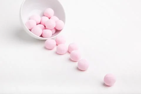 Candy scattered on the table Stock Photos