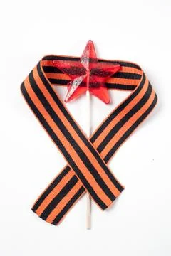 Candy in the shape of a star, a red candy on a stick, Stock Photos