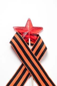 Candy in the shape of a star, a red candy on a stick, Stock Photos