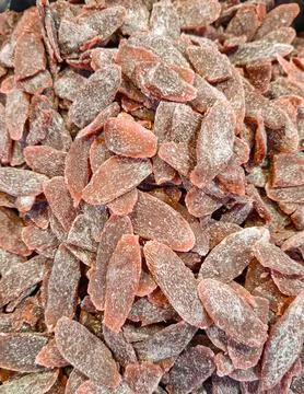 Candy shaped like fish is piled high on display at a candy store in the aft.. Stock-Fotos