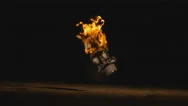 A Candy Skull Molotov Cocktail Falls To The Ground And Explodes. Slow Motion. Stock Footage