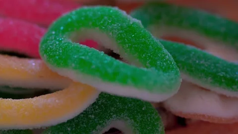 Candy sweets background. mixed candies. Colorful delicious sweets turning top vi Stock Footage 230612863