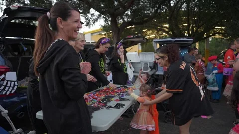 Candy Table at School Halloween Trunk-or-Treat Stock Footage 318113955