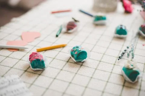 Candy on the table with wax pencils Stock Photos