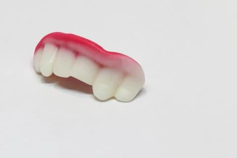 Candy teeth on white background Stock Photos
