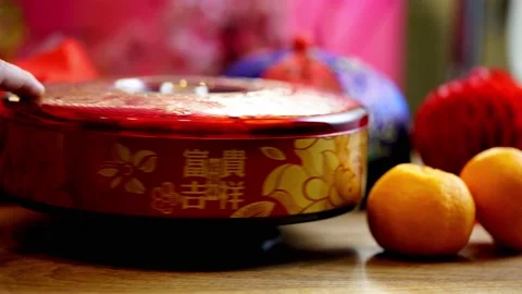 Candy tray mandarin orangesand others chinese new year decoration items Stock Footage 147047236