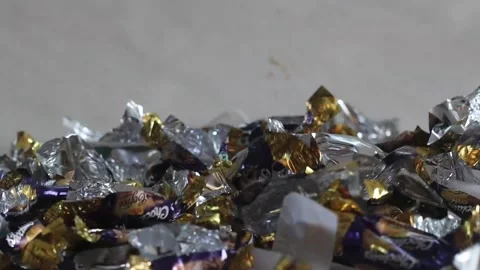 Candy wrappers falling in slow motion Stock-Footage 237109787
