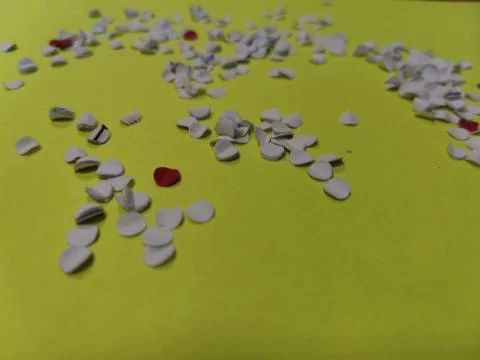 Candy on yellow paper Stock Photos