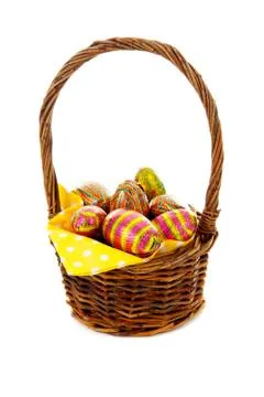 Cane basket with easter eggs Stock-Fotos