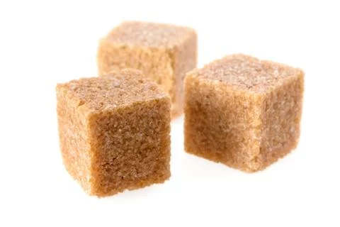 Cane sugar cubes Stock Photos