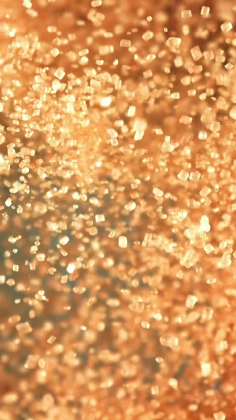 Cane sugar flies up and down. Filmed on a high-speed camera at 1000 fps Stock Footage 335383735