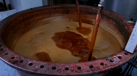 Cane sugar mill boiling juice of sugar cane into molasses, Madeira, Portugal Stock Footage 50442932