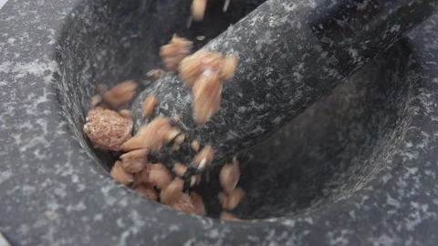 Cane sugar poured into a mortar Stock Footage 212736442