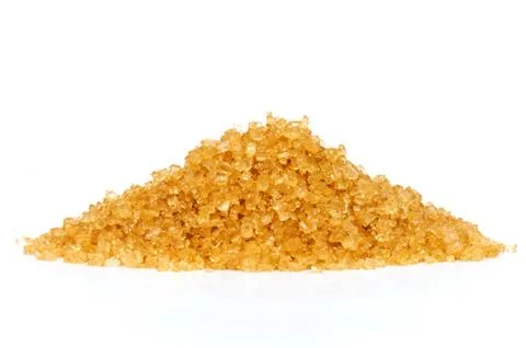 Cane sugar on white background . Foto stock