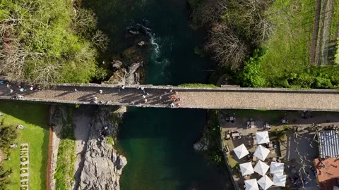 Cangas de Onis Historic Bridge Sella River Asturias Spain Aerial Видео 337904015