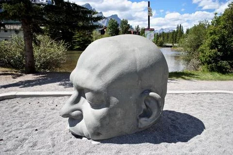 Canmore, Alberta, Canada: Giant granite head sculpture Stock Photos