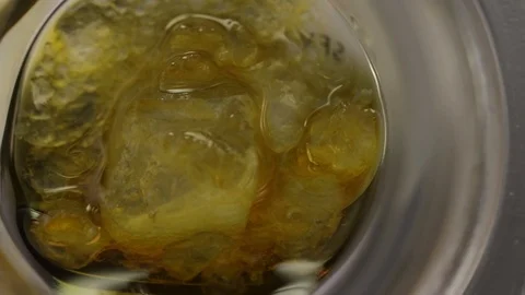 Cannabis Terpenes Dripping Around THCa Crystals Stock Footage
