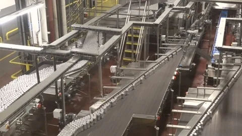 Canned beverages stream off assembly line canning plant Stock Footage 76807459