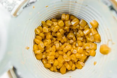 Canned corn in a jar close-up. Stock Photos