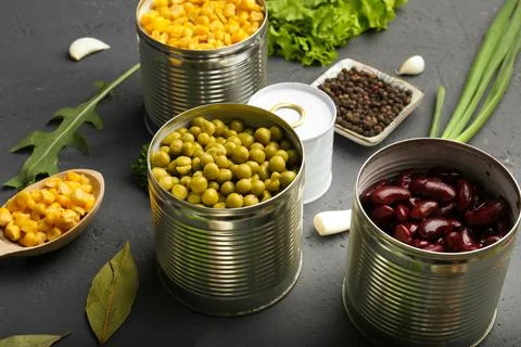 Canned corn, peas, beans Stock Photos