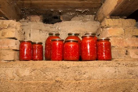 Canned jars on a shelf Stock Photos