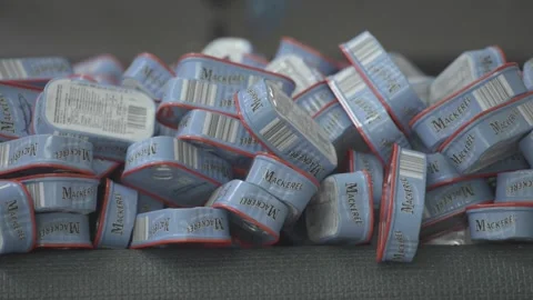 Canned Seafood Falling off of the Roller Stock-Footage 232962960