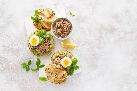 Canned tuna open sandwiches. Buns burgers with canned tuna, boiled egg Stock Photos