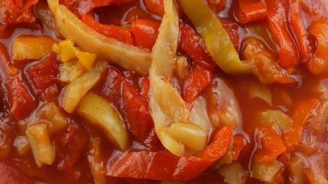 Canned vegetable lecho on the plate Stock Footage 103229795
