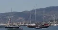 Cannes City Port Skyline with Luxury Sail Boat Docked in Mediterranean Sea Day 4k or 4k+ Resolution