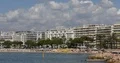Cannes City Skyline Crowd of Tourists People Sunbathing Beach of French Riviera 4k or 4k+ Resolution