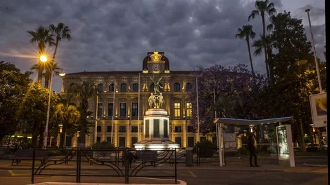 Cannes: Monument with Clouds and Traffic during Night Stock Footage 70674053