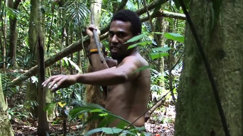 Cannibal Native man in the Jungle Stock Footage 44760106