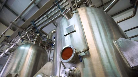 Canning Factory . The Line for Processing Tomatoes. Cooking of Tomato Paste Stock Footage 95172212