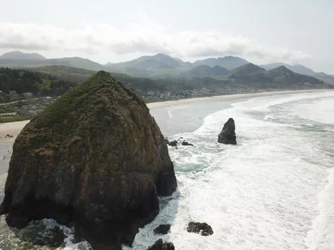 Cannon Beach, Oregon - Haystack Rock - Pacific Northwest by drone Stock Photos
