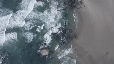 Cannon Beach Surf and Haystack Rock Aerial 4K Stock Footage 208869741