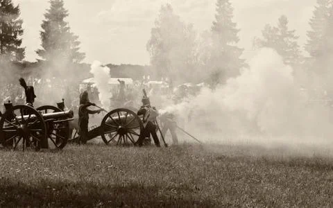 The cannon fire on the battlefield Stock Photos