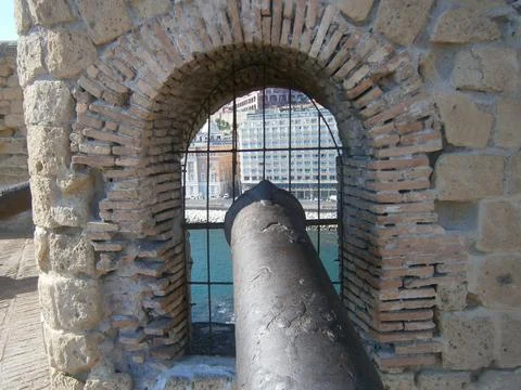 Cannon pointing at a window Stock Photos