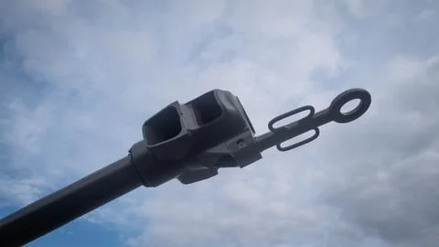 A cannon is positioned prominently, with clouds rolling in the background. This Stock Photos