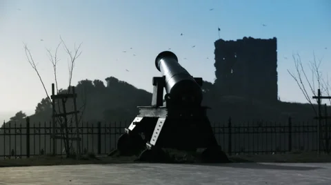 Cannon towards ancient castle on remote island. Stock Footage 3144297