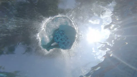 Cannonball in pool Stock Footage 134663551