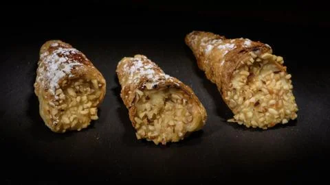 Cannoncini stuffed with custard Stock Photos