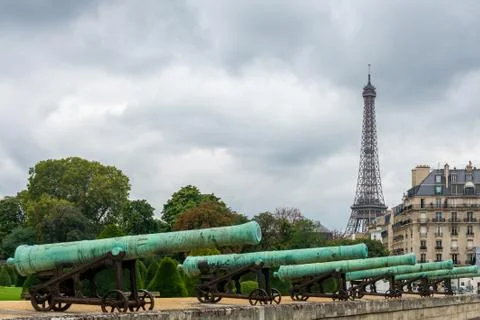 Cannons with Eiffel Tower in Paris Stock Photos