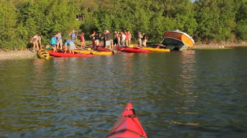 Canoe approaching the shore Stock Footage 33878134