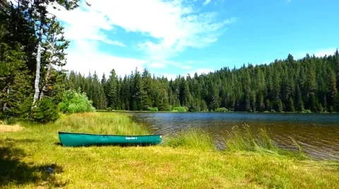 Canoe Ashore an Alpine Lake Видео 40245476
