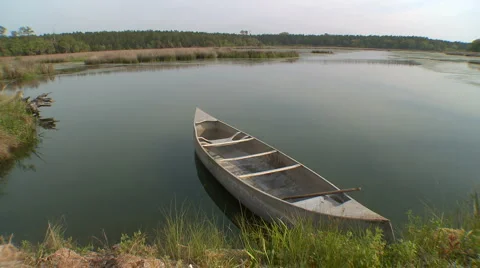 Canoe on bank HD Stock Footage 5501286