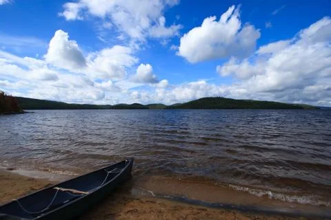 Canoe on the beach Stock Photos