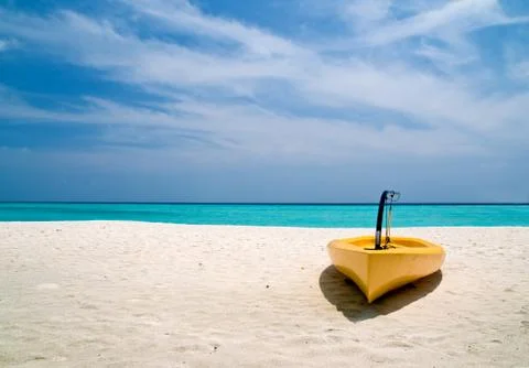 Canoe on the beach Stock Photos