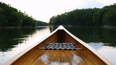 Canoe deck floating on the water Stock Footage 116086522