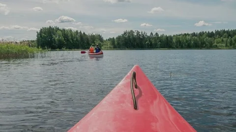 Canoe floating on the lake Stock Footage 52318976