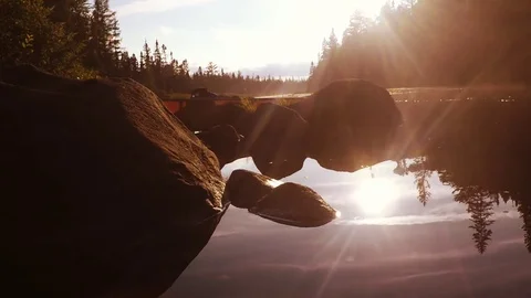 Canoe lake reflection at sunset Stock Footage 81915848